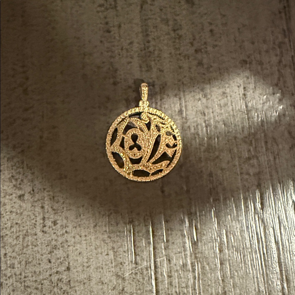 Gold “LOVE” Pendant